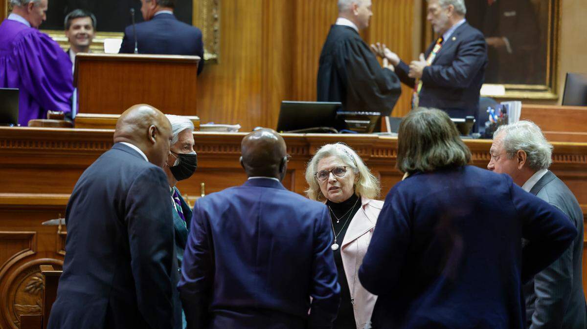 Senators confer during a break while debating amendments about the ban on abortion in the South Carolina Senate chamber on Thursday Sept. 08, 2022.