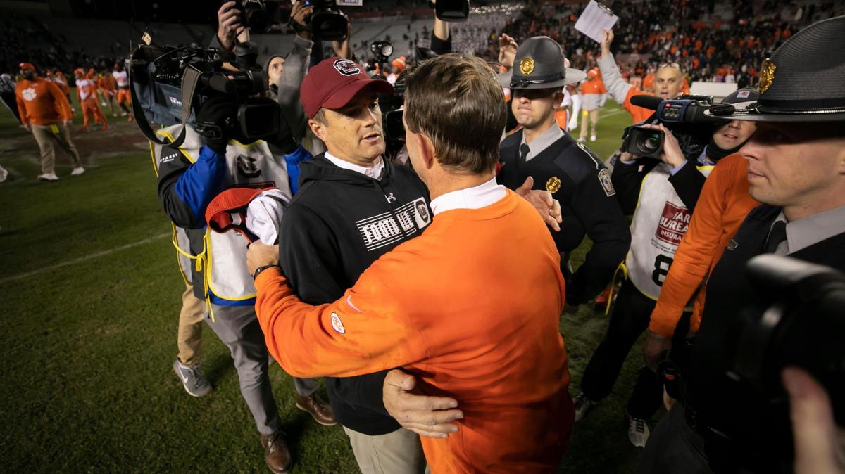 Shane Beamer speaks with Dabo Swinney following the Gamecocks’ loss to Clemson at Williams-Brice Stadium on Saturday, November 27, 2021.