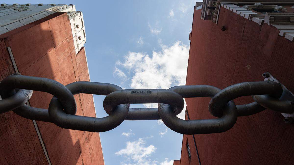 Blue Sky’s “Never Bust” sculpture hangs between Main Street’s Kress and Sylvan buildings across from the Columbia Museum of Art on Tuesday, April 1, 2025.