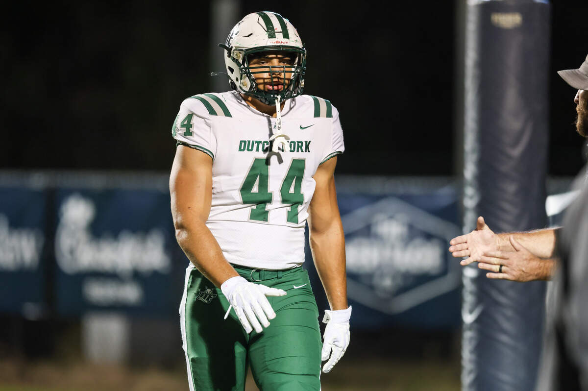 Jaden Wuerth (44) of Dutch Fork warms up before White Knoll’s game against visiting Dutch Fork in Lexington on Friday, October 10, 2025.