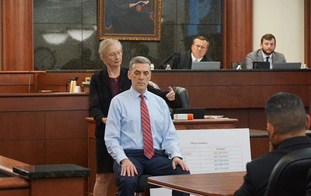 Pathologist Dr. Janice Ross demontrates the trajectory of the bullets that killed Arturo Bravo Santos on 11th Circuit Solicitor Rick Hubbard on June 23, 2023 inside of the Lexington County courthouse.