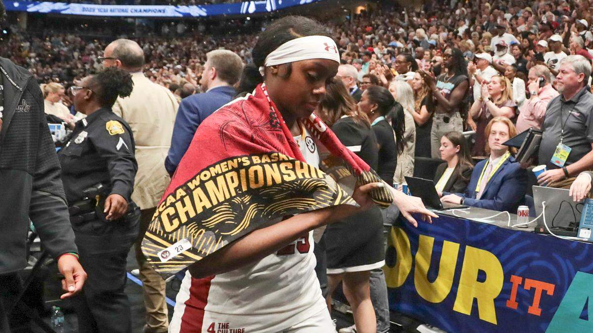 Raven Johnson leaves the court at Amalie Arena after the national championship loss to UConn.