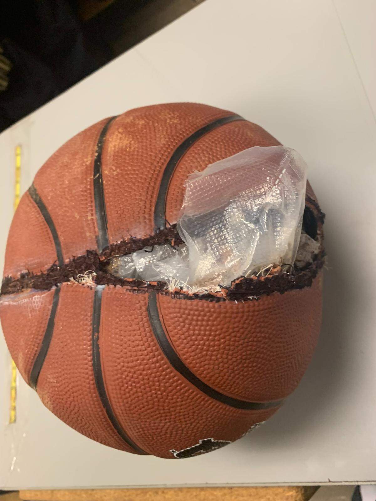 This basketball, filled with a variety of illicit drugs, was smuggled into a S.C. prison by a drone.