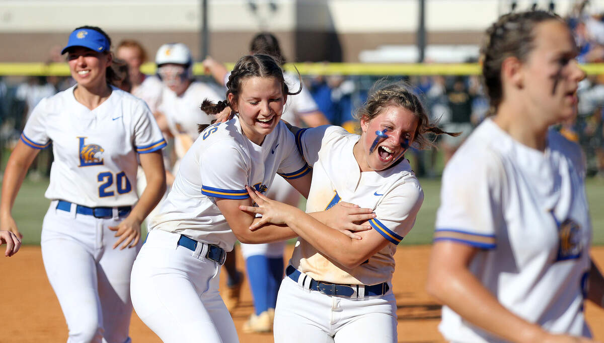 Lexington softball celebrates a walk-off win Tuesday over Summerville.