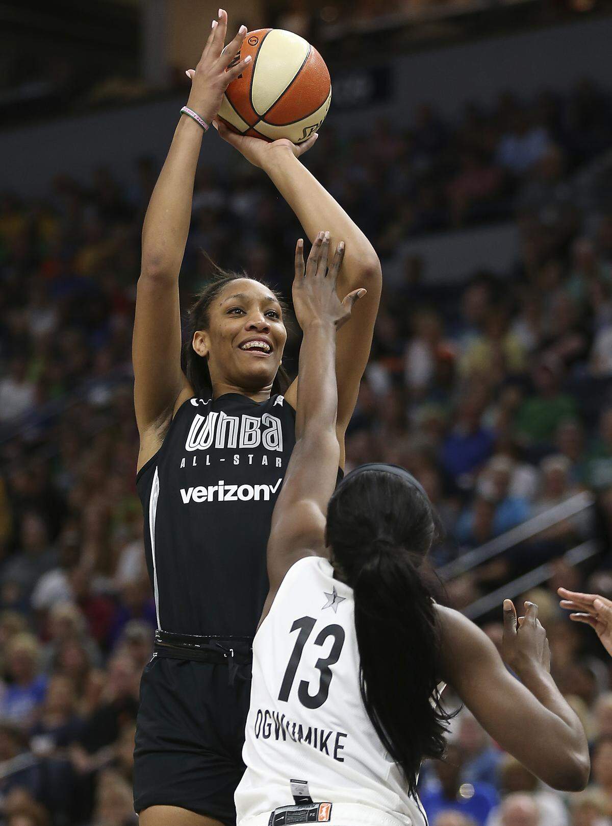 In this July 28, 2018, file photo, Team Delle Donne’s A’ja Wilson, left, shoots the ball against the Team Candace Parker’s Chiney Ogwumike, right, during the first half of the WNBA All-Star basketball game in Minneapolis.