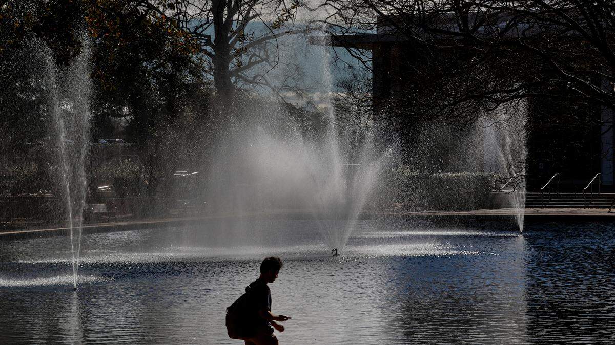 Students walk across campus at the University of South Carolina in Columbia.