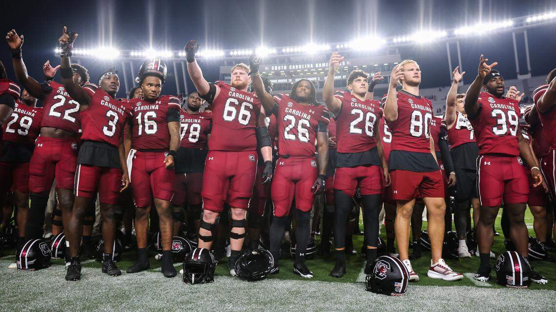 South Carolina players stand for the alma mater following the Gamecocks’ game against South Carolina State at Williams-Brice Stadium in Columbia on Sunday, September 7, 2025.