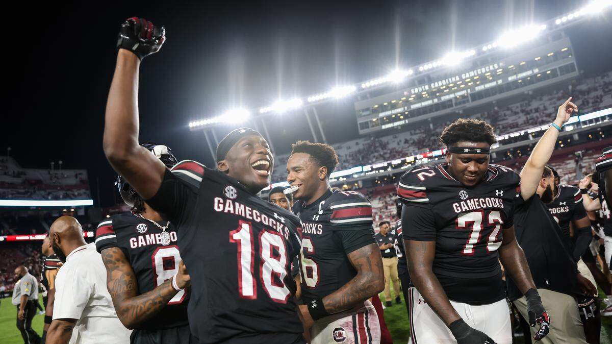 South Carolina defensive back Jaquel Holman (18) jokes with teammates following the Gamecocks’ game against Kentucky at Williams-Brice Stadium in Columbia on Saturday, September 27, 2025.
