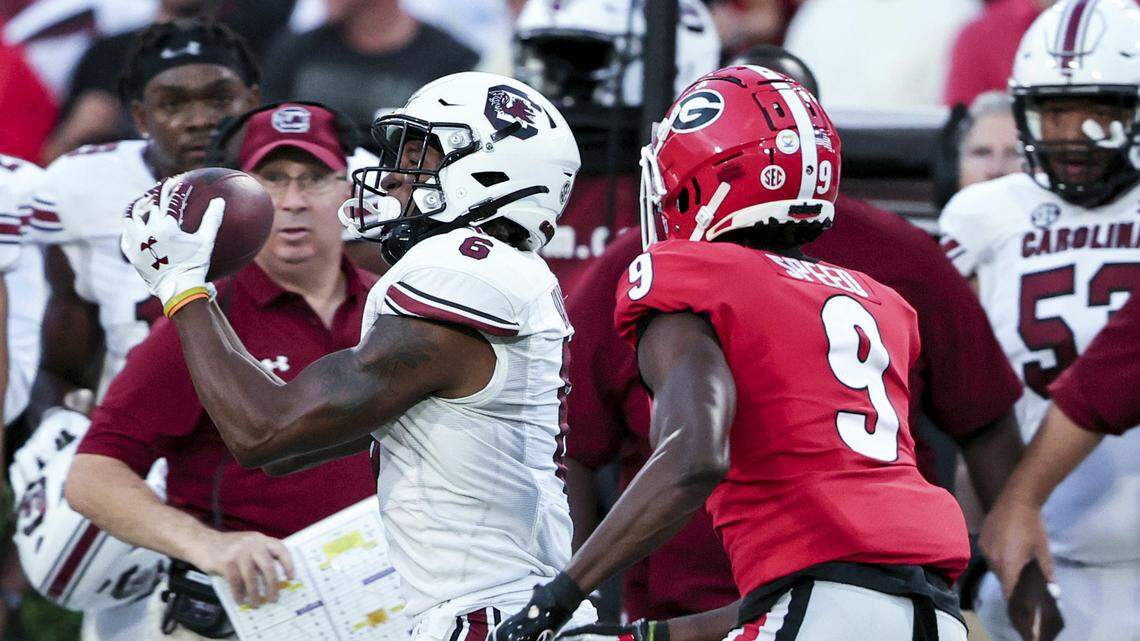 South Carolina wide receiver Josh Vann (6) catches a pass next to Georgia defensive back Ameer Speed (9) during the first half of an NCAA college football game Saturday, Sept. 18, 2021, in Athens, Ga. (AP Photo/Butch Dill)