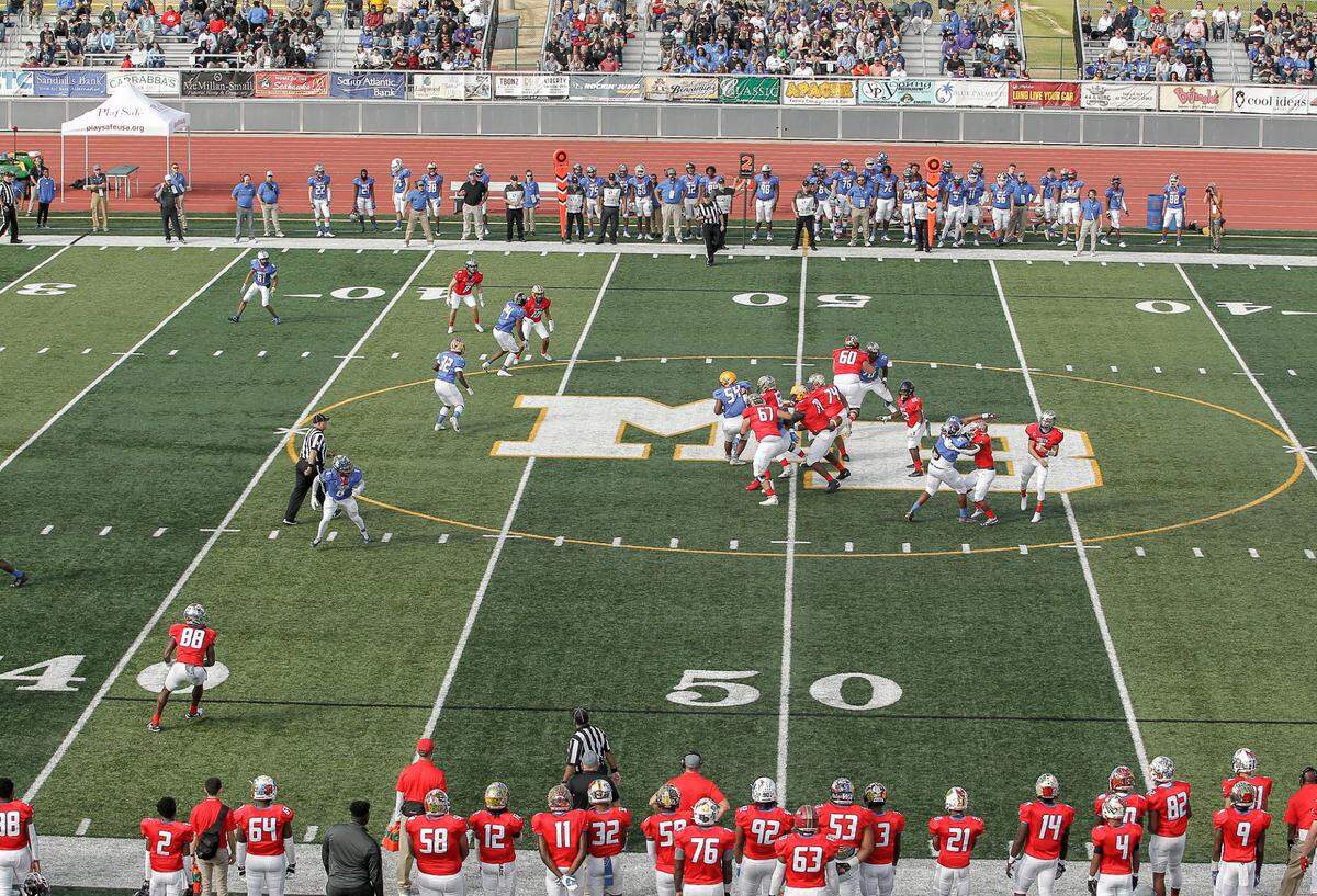 South quarterback Ryan Burger, 6, of Myrtle Beach targets receiver and high school teammate Adam Randall, 88, in the 2021 Touchstone Energy Bowl, held at Doug Shaw Memorial Stadium in Myrtle Beach, S.C.