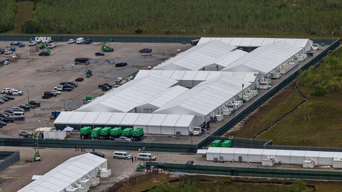 Aerial view of structures, including gigantic tents, built at the recently opened migrant detention center Alligator Alcatraz, located at the site of the Dade-Collier Training and Transition Airport in Ochopee, Florida, on July 4, 2025. (Pedro Portal/Miami Herald/TNS)