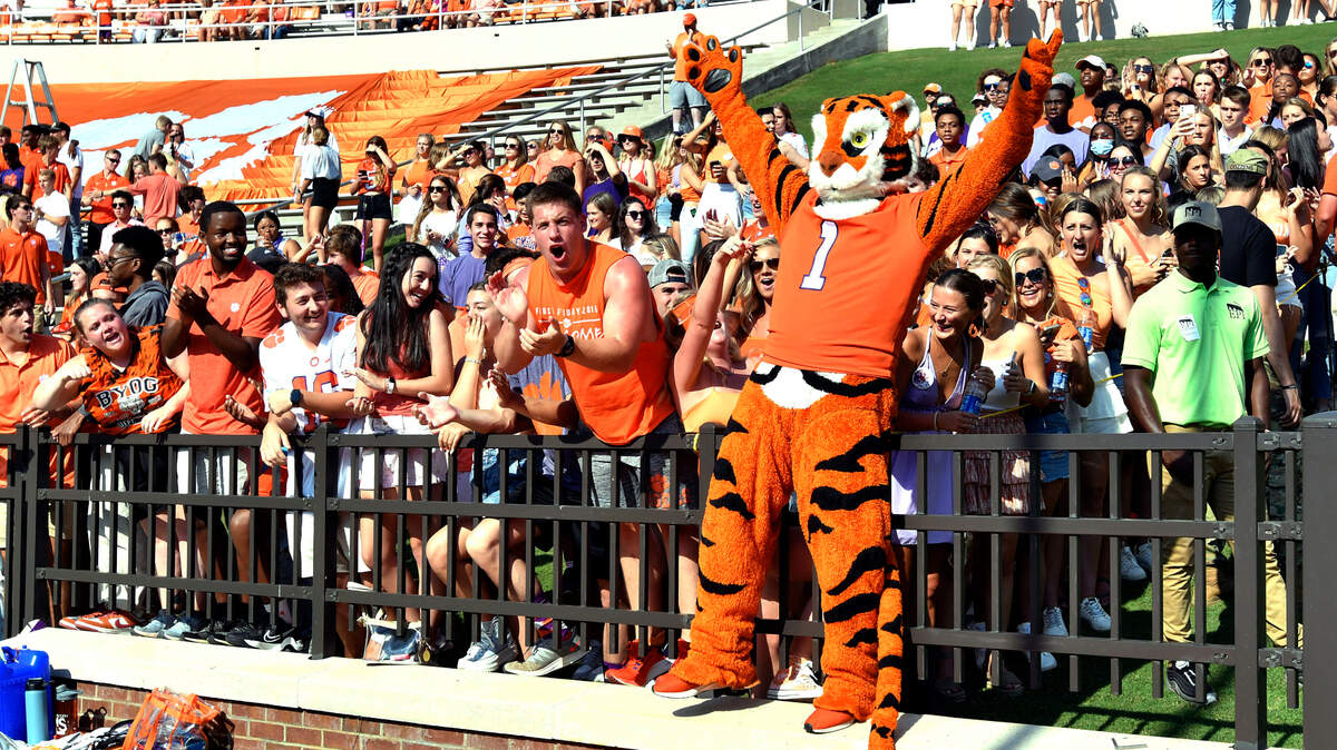 Clemson fans cheer before an NCAA college football game against South Carolina State on Saturday, Sept. 11, 2021, in Clemson, S.C. (AP Photo/Edward M. Pio Roda)