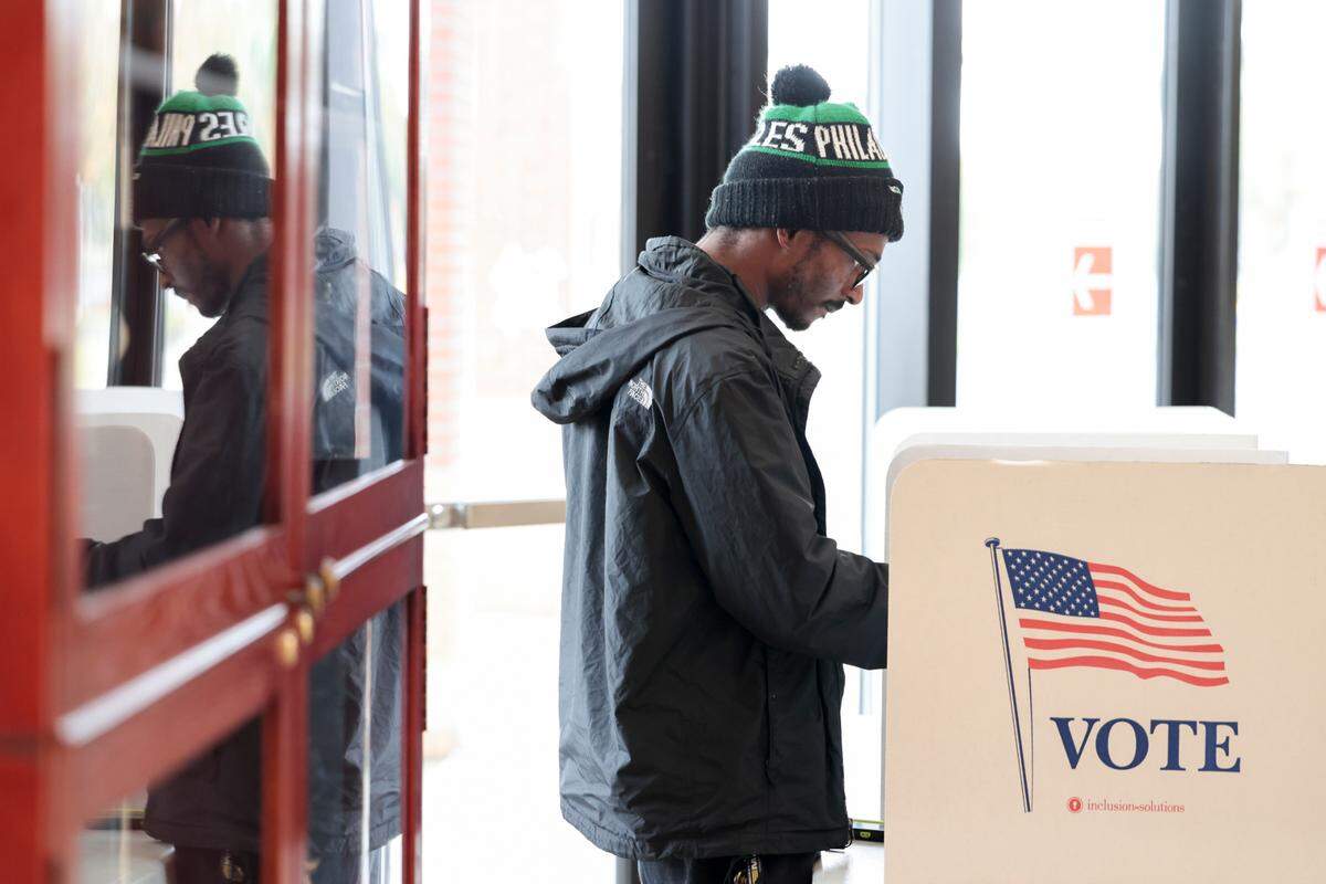 Eric Bey votes for the first time on Tuesday, Nov. 5, 2024 at Lower Richland High School. Bey, 27, said “It’s time for something new, something different. Hopefully (Kamala) Harris will do what she says she will do.”