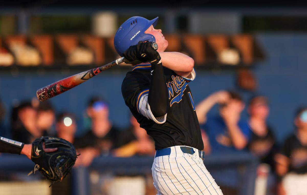 Christian Spivey (13) of Lexington looks up after connecting with a pitch during Game 1 of the Class 5A Upper State championship series in Columbia on Tuesday, May 20, 2025.
