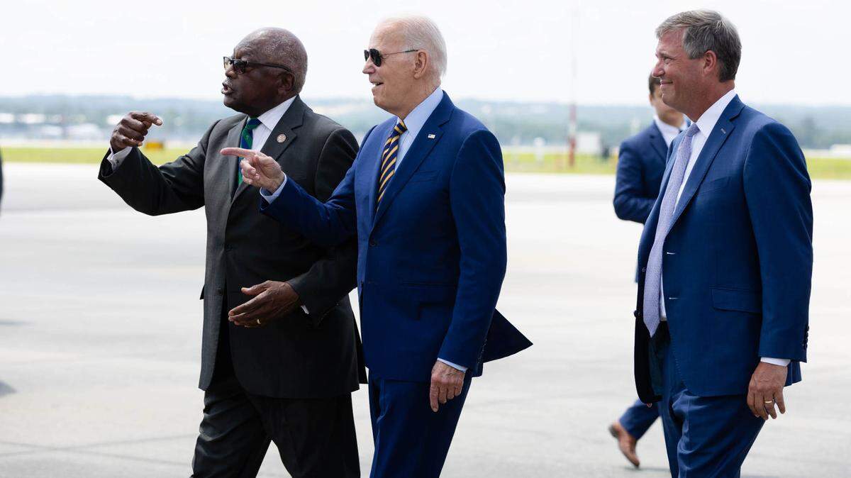 President Joe Biden arrives at Columbia Metropolitan Airport on Thursday, July 6, 2023. He is seen walking with U.S. Rep. Jim Clyburn, D-Columbia, and Columbia Mayor Daniel Rickenmann.