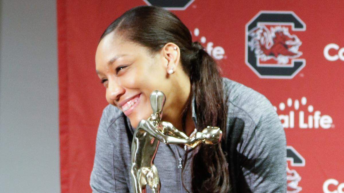 A'ja Wilson is presented the Citizens Naismith trophy during a ceremony in front of the Colonial Life Arena in Columbia. 4/9/18