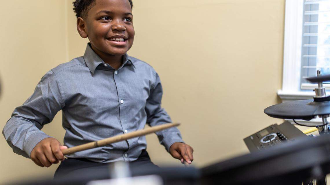 Noah Eldridge learns how to play the drums at Columbia Arts Academy in Shandon.