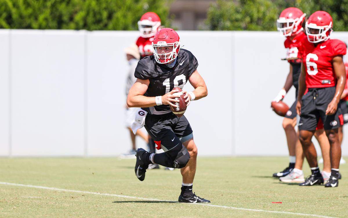 Georgia quarterback JT Daniels (18) during the Bulldogs’ practice session in Athens, Ga., on Wednesday, Aug. 19, 2020.