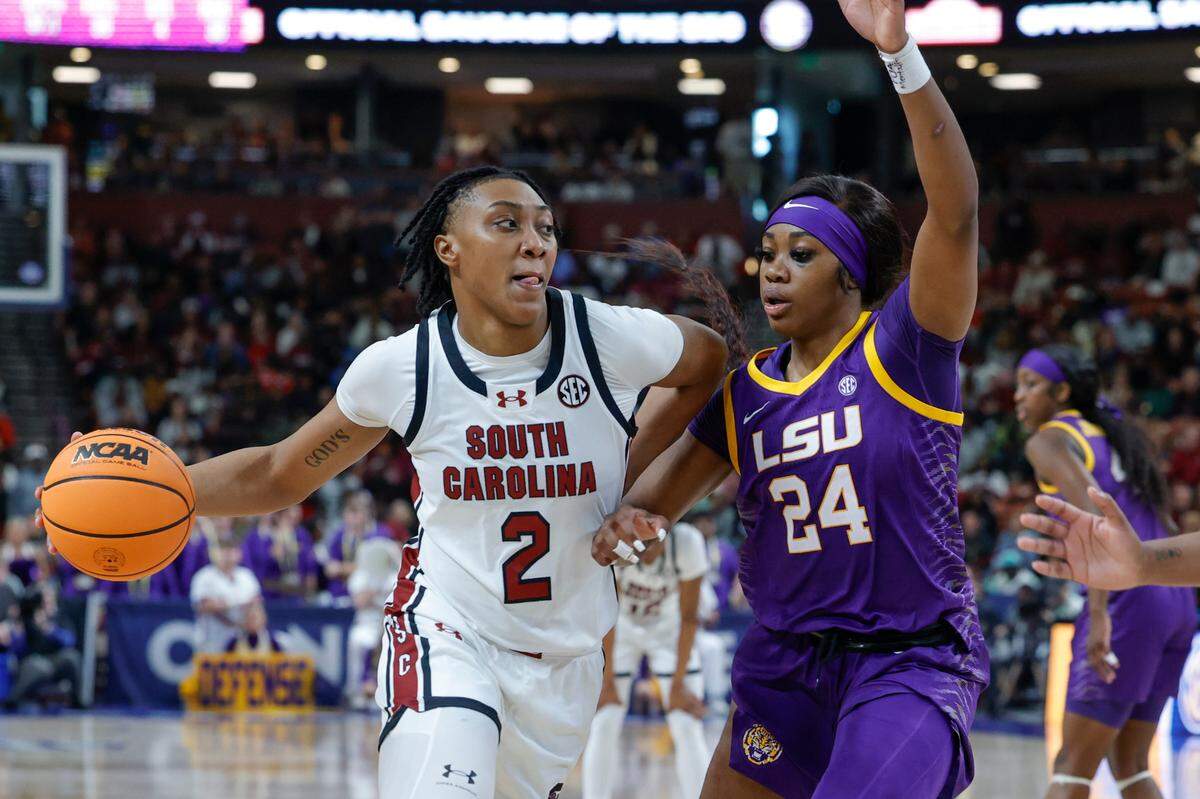 South Carolina’s Ashlyn Watkins (2) drives the ball as LSU’s Aneesah Morrow (24) pressures during the first half of action in the SEC Tournament Championship game at Bon Secours Wellness Arena in Greenville on Sunday, Mar. 10, 2024.