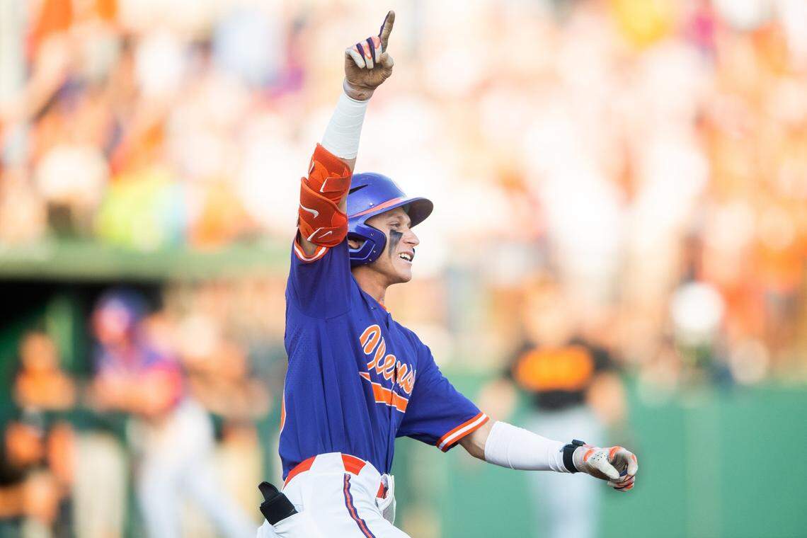 Clemson’s Cam Cannarella (10) gestures in celebration after hitting a three-run home run during a NCAA baseball regional game against Tennessee at Doug Kingsmore Stadium in Clemson, S.C., on Saturday, June 3, 2023.