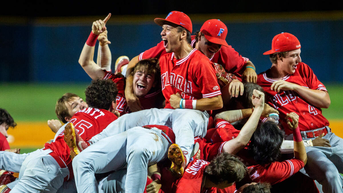 A.C. Flora celebrate winning the high school baseball Class 4A state championship series at James Island on Thursday June 3, 2021, in Charleston.