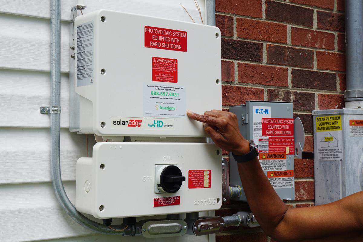 Pointing to the utility box installed by Freedom Forever connected to the solar panels on her roof, Carnell Conyers, 68, says that the panels have never provided her home with any power because they aren’t connected to the grid.