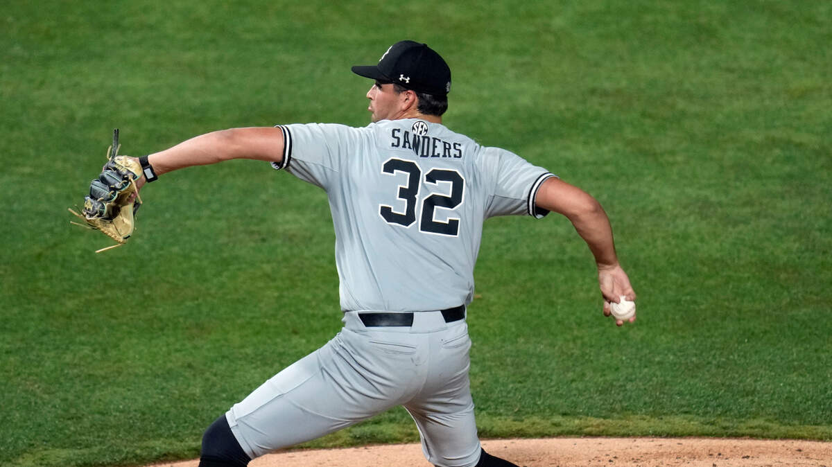 South Carolina pitcher Will Sanders throws to Florida batter during the sixth inning of an NCAA college baseball tournament super regional game Friday, June 9, 2023, in Gainesville, Fla.