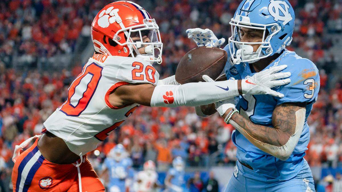 Clemson cornerback Nate Wiggins (20) breaks up a pass intended for North Carolina wide receiver Antoine Green (3) in the end zone in the first half during the Atlantic Coast Conference championship NCAA college football game on Saturday, Dec. 3, 2022, in Charlotte, N.C. (AP Photo/Jacob Kupferman)