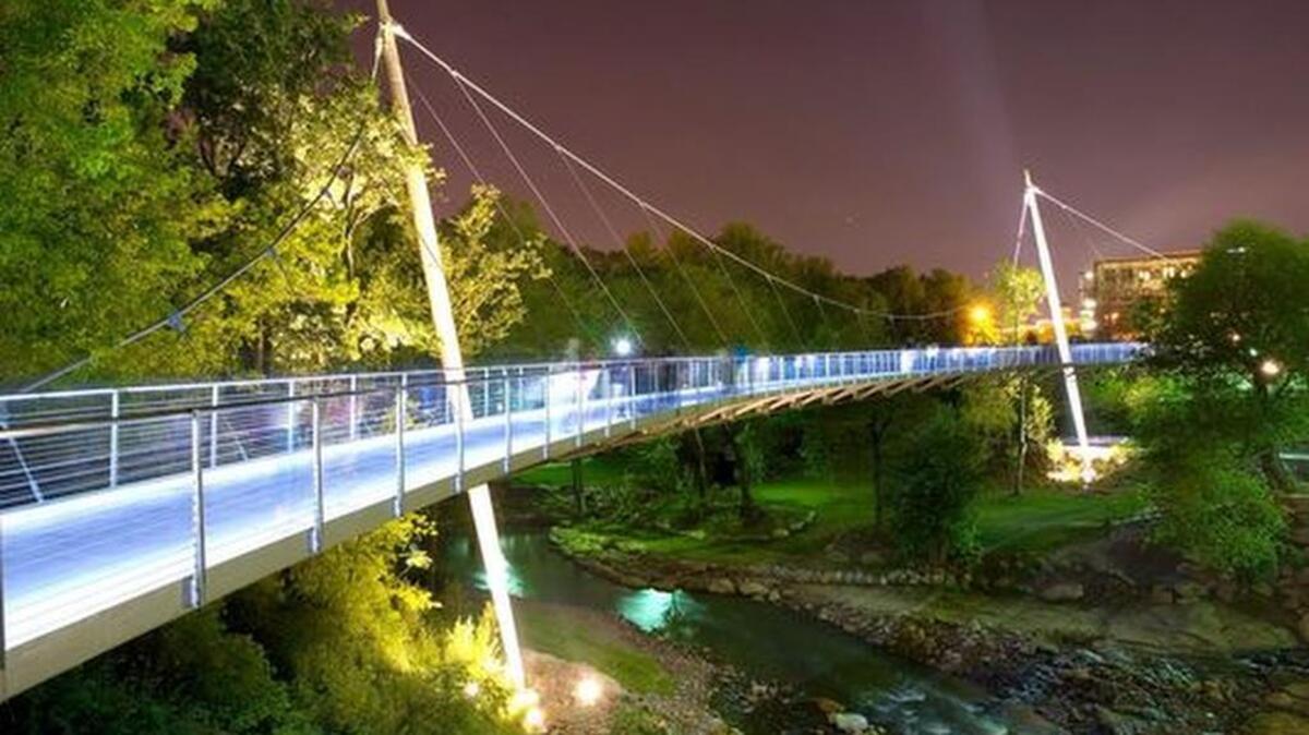 Downtown Greenville’s Liberty Bridge across the Reedy River at the waterfalls has been widely acclaimed since it was built in 2004.
