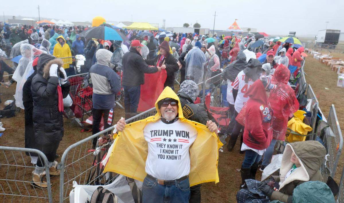 Supporters gather hours ahead of former President Donald Trump’s rally in Florence, S.C., on Saturday, March 12, 2022.