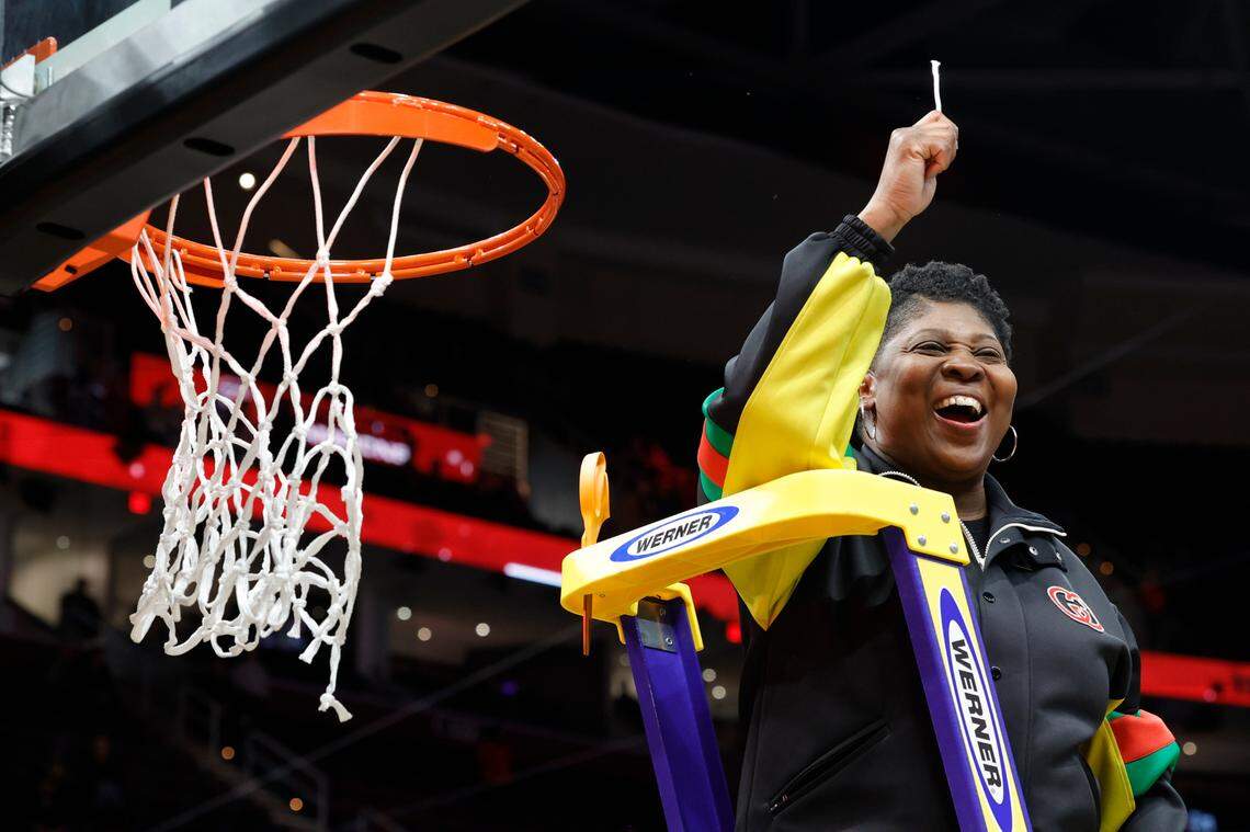 University of South Carolina Assistant Coach Jolette Law cut a piece of the net after winning the national championship after beating Iowa at the Rocket Mortgage FieldHouse in Cleveland, Ohio, on April 7, 2024.