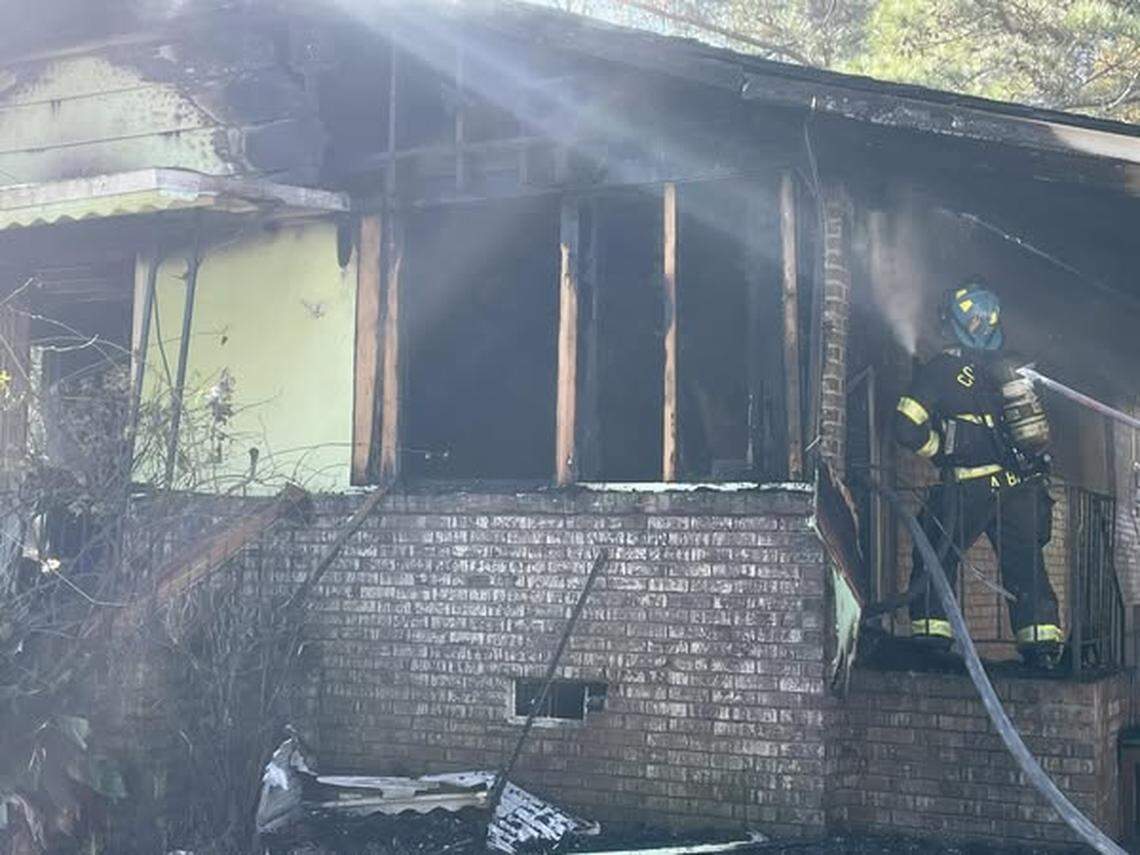The Columbia Fire Department battles a blaze at a home.