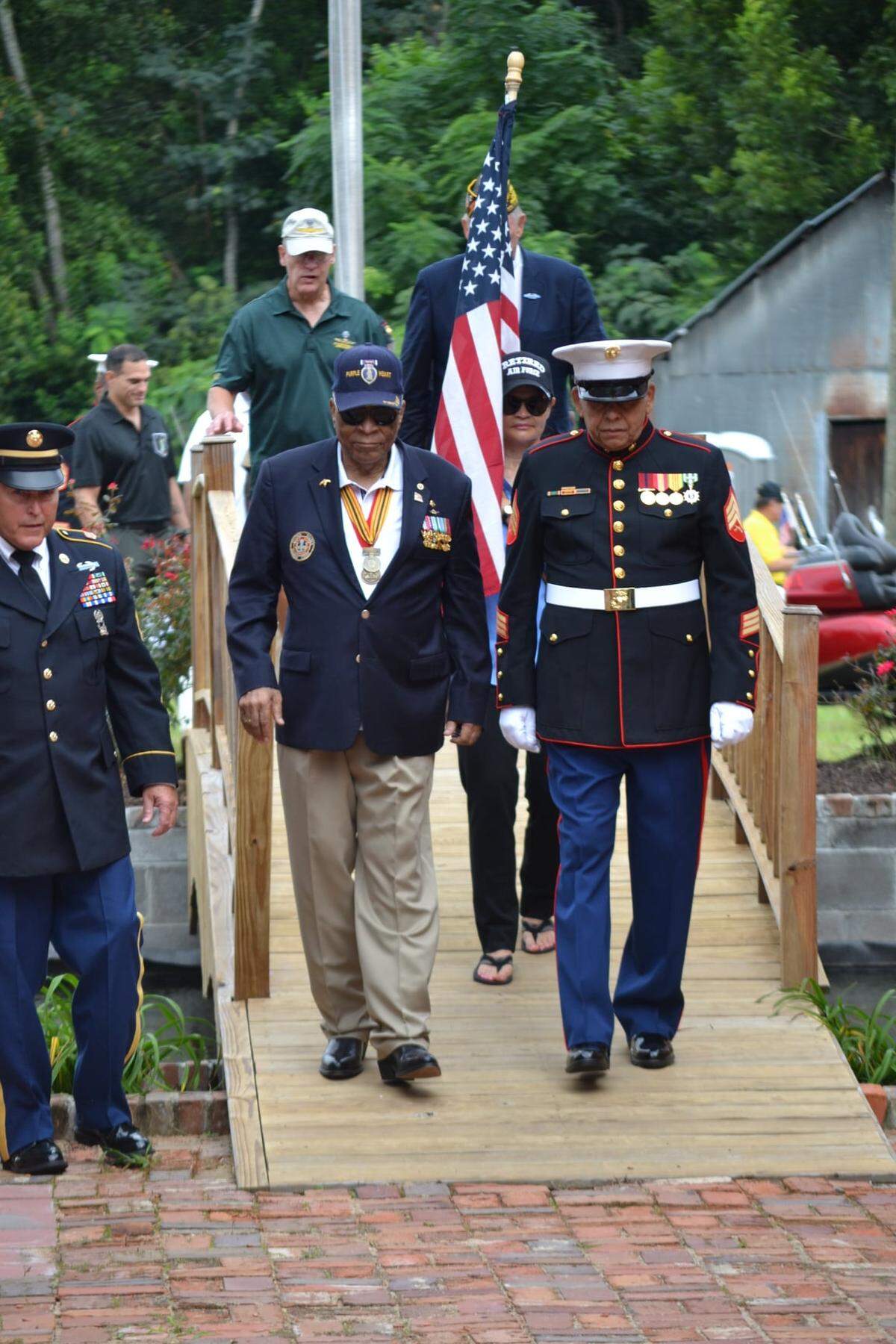 Maj. James Capers, left, during a visit to Bishopville, SC, in 2020.