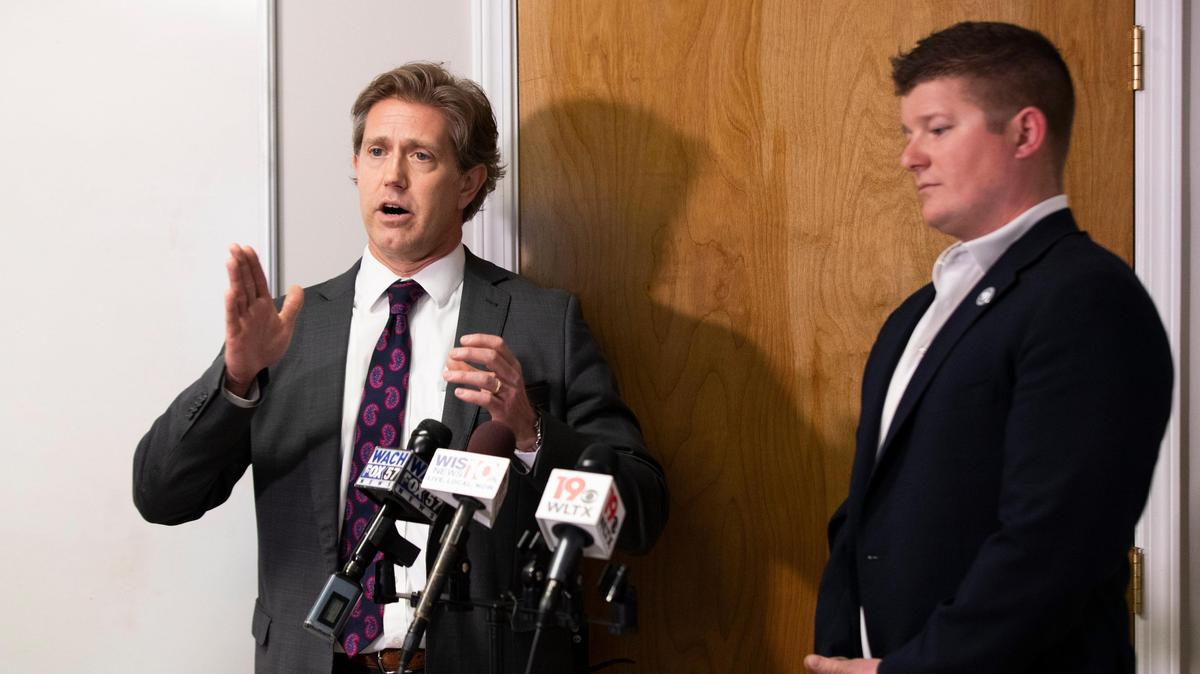 Local attorney and School Board member John Milling and County Councilman Joe Walker speak to reporters, asking for further investigation from the state attorney general and an internal investigation in the Richland 1 school district on Thursday, March 12, 2020.