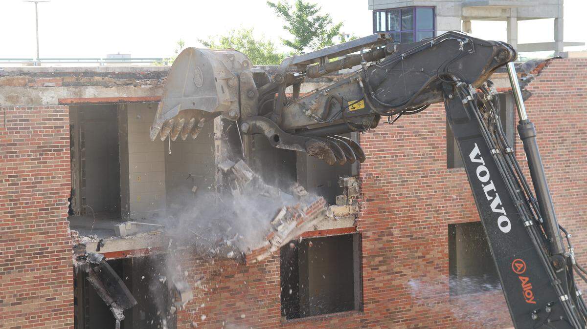 An excavator begins demolition of the McBryde residence hall on the University of South Carolina campus on Friday, May 8, 2026.