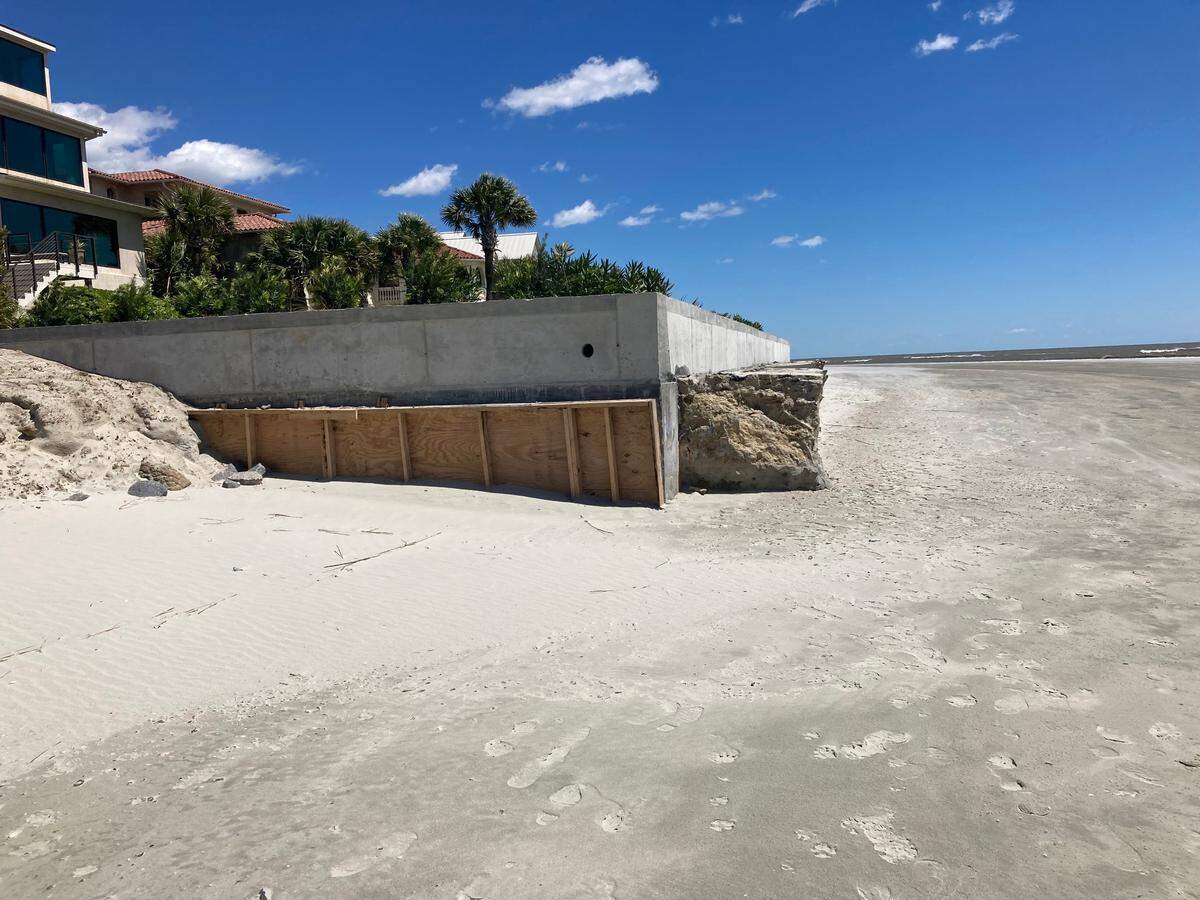 Seawalls and development on the beach are at the center of a growing dispute in South Carolina over how tightly to regulate oceanfront building as sea level rises. This property is at the Isle of Palms.
