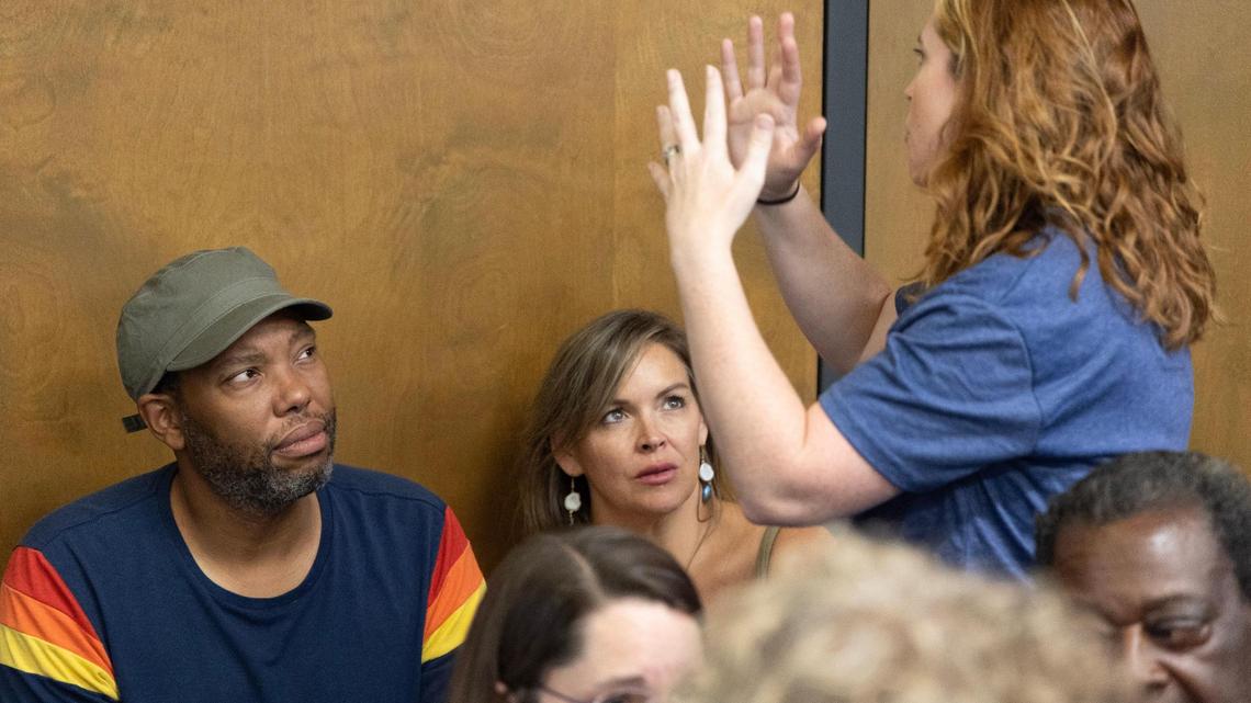 Ta-Nehisi Coates and Mary Wood, a teacher at Chapin High School, speak with Wood’s supporters before a meeting of the Lexington-Richland 5 school board on Monday, July 17, 2023.