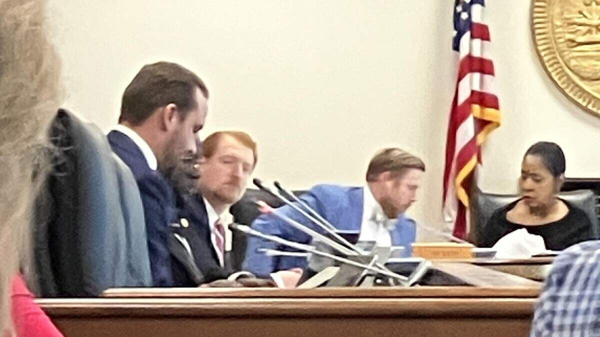 SC Reps. David Martin, foreground, and Josiah Magnuson, center, discuss bill to put more control on polluting industries in the wake of chemical spills from a solar panel maker.. Photo taken March 5, 2026