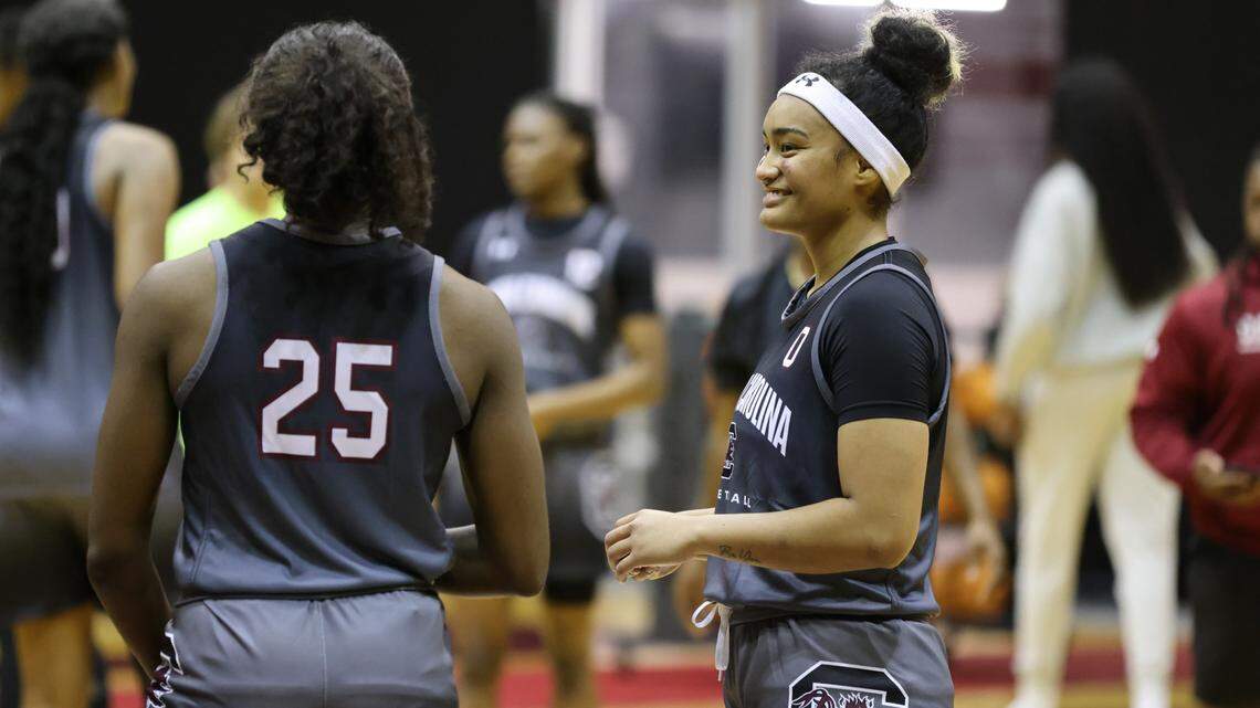 South Carolina guard Te-Hina Paopao (0) laughs with teammate guard Raven Johnson (25) during practice at Carolina Coliseum in Columbia on Thursday, September 28, 2023.