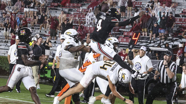 Rain! Gain! Swain! South Carolina runs past Towson to reach 2-0 mark before SEC play