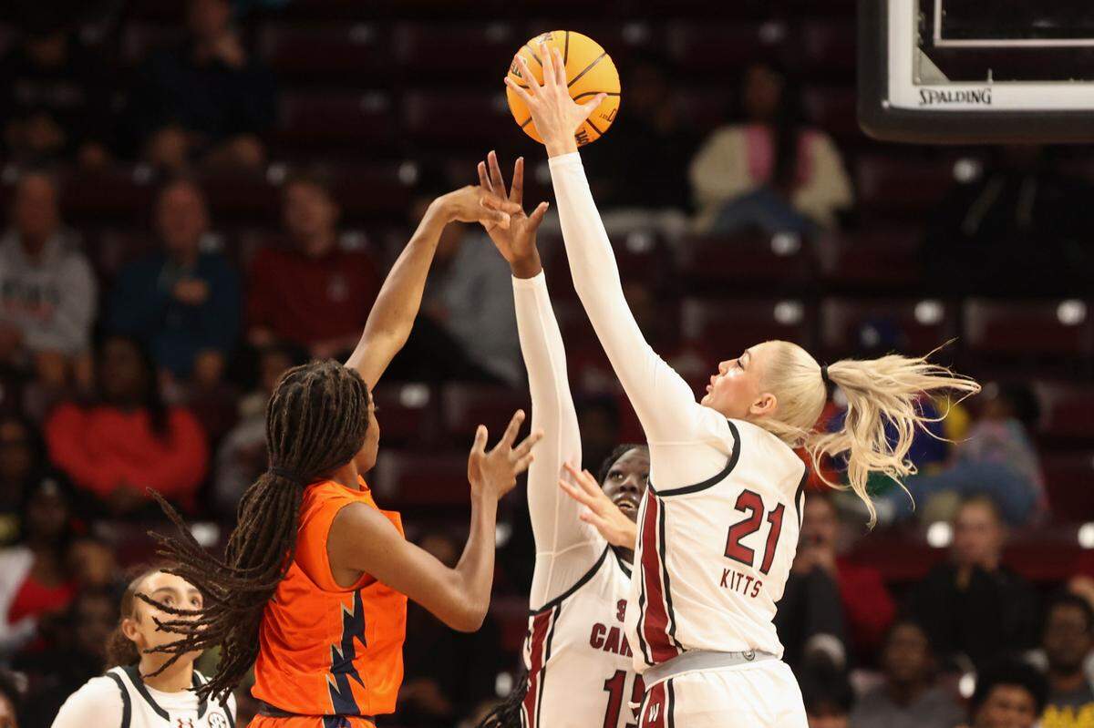 University of South Carolina forward Chloe Kitts (21) snags the ball from pressure during the first half of action in the Colonial Life Arena on Monday, Oct. 28, 2024.