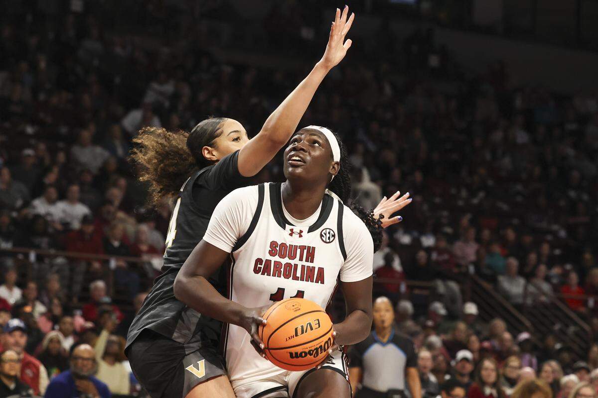 South Carolina's Madina Okot (11) looks to shoot as Vanderbilt's Aiyana Mitchell (14) pressures during the first half of action of their women's basketball game against Vanderbilt at Colonial Life Arena on Sunday, Jan. 25, 2026.