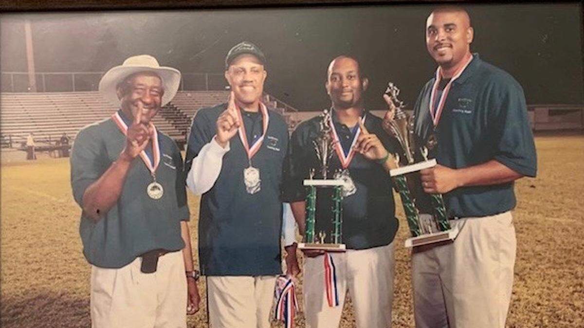 Theodius Oates Jr. (second from the left) was a longtime Richland 1 teacher and coach. He passed away last month.
