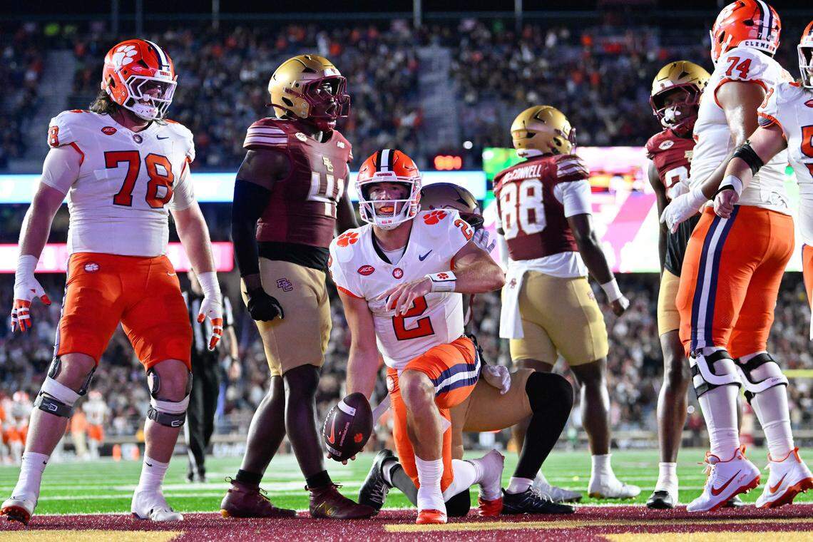 Clemson Tigers quarterback Cade Klubnik (2) scores a touchdown against the Boston College Eagles during the first half at Alumni Stadium.