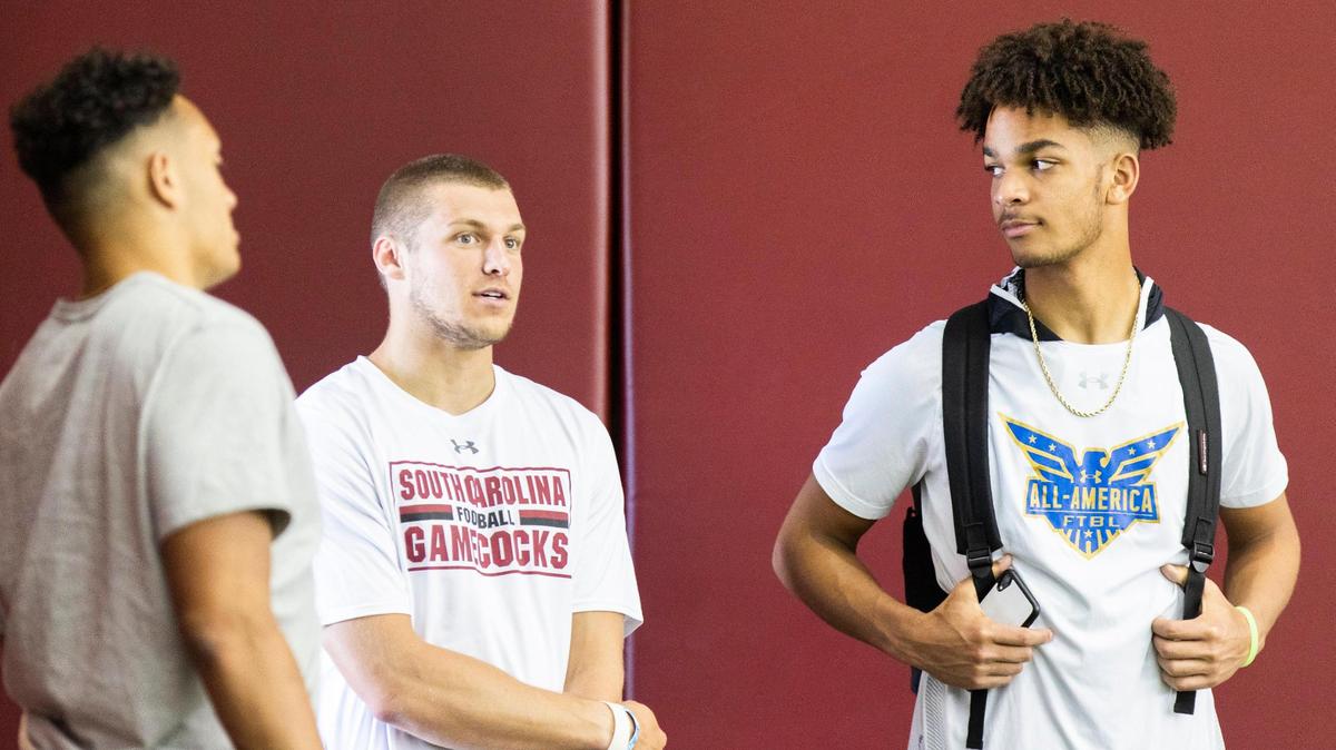 South Carolina quarterback commitment Braden Davis visits on June 17, 2021 and talks with current USC QBs Jason Brown, left, and Luke Doty.