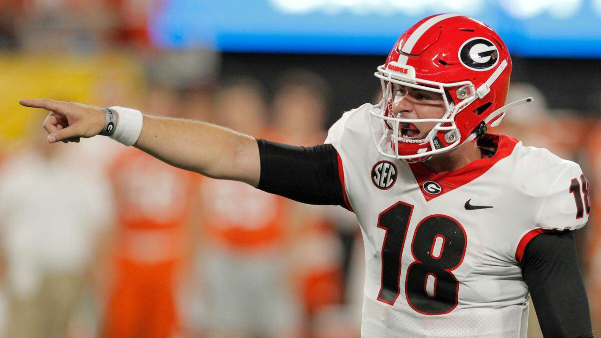 Georgia quarterback JT Daniels (18) is seen against Clemson during first-quarter action of the Duke’s Mayo Classic in Charlotte, N.C. on Saturday, Sept. 4, 2021.