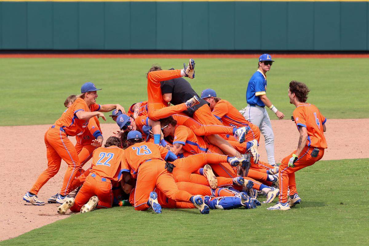 Lexington High players clear the field as James Island celebrates their Class 5A Division I Baseball championship win played at Riley Field in Sumter on Saturday, May 31, 2025.