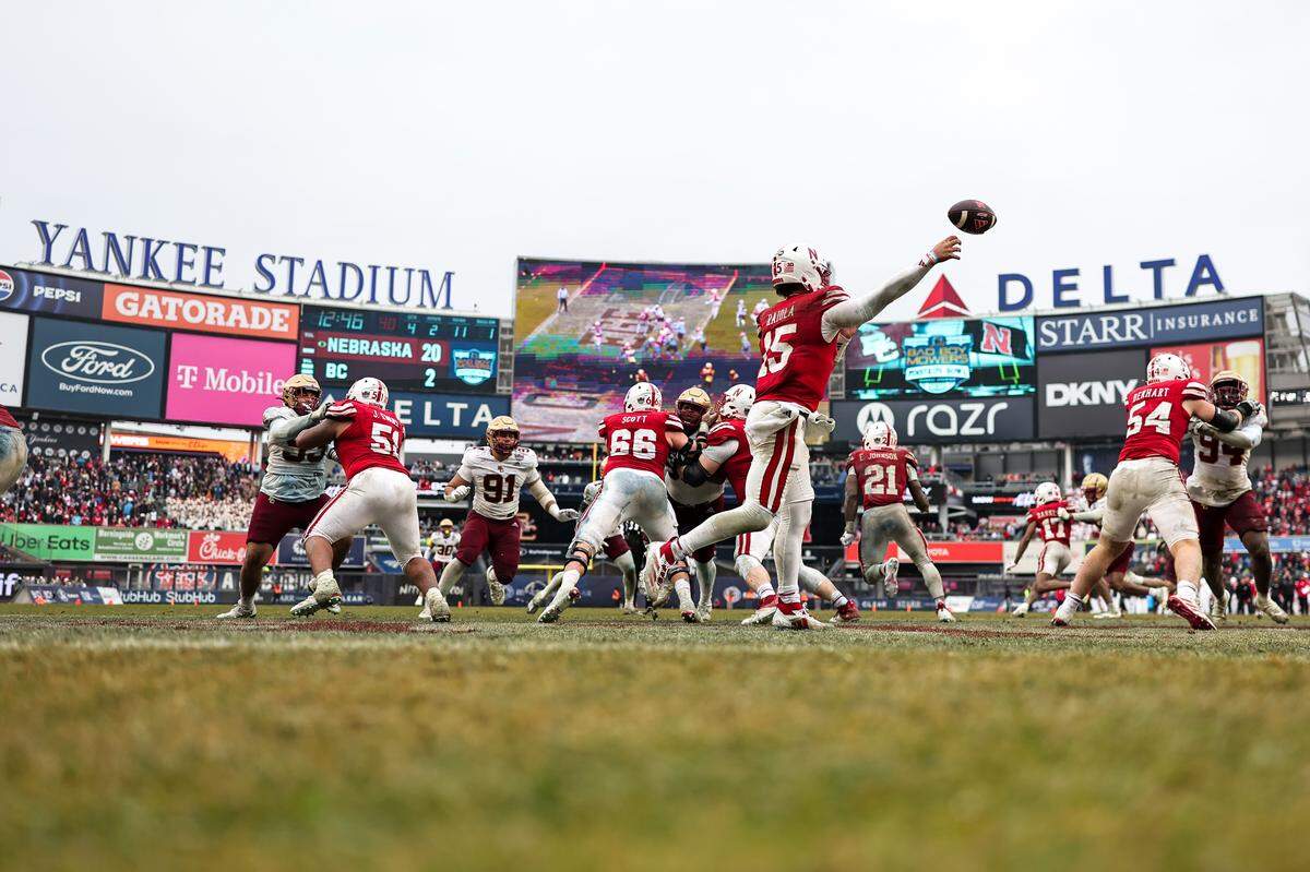 Dylan Raiola #15 of the Nebraska Cornhuskers throws a pass during the fourth quarter of the Bad Boy Mowers Pinstripe Bowl against the Boston College Eagles at Yankee Stadium on Dec. 28, 2024 .