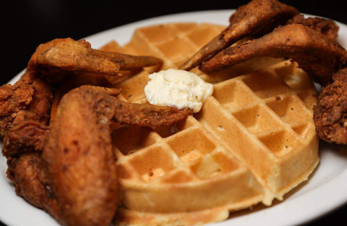 A plate of chicken and waffles is photographed at Kiki’s Chicken and Waffles in Columbia on Friday, March 29, 2024.