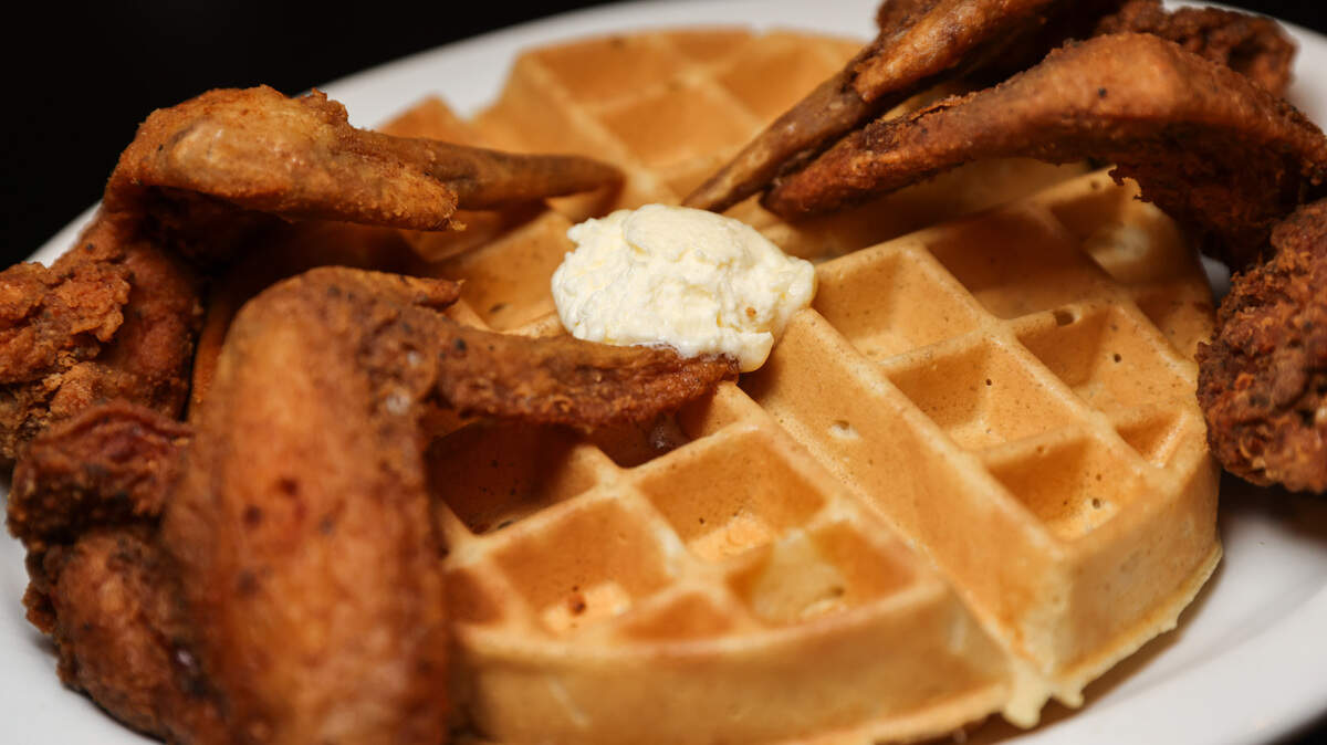 A plate of chicken and waffles is photographed at Kiki’s Chicken and Waffles in Columbia on Friday, March 29, 2024.